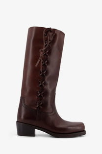 Brown leather knee-high Paris Texas women’s Roxanne boot showing lace-up back and block heel