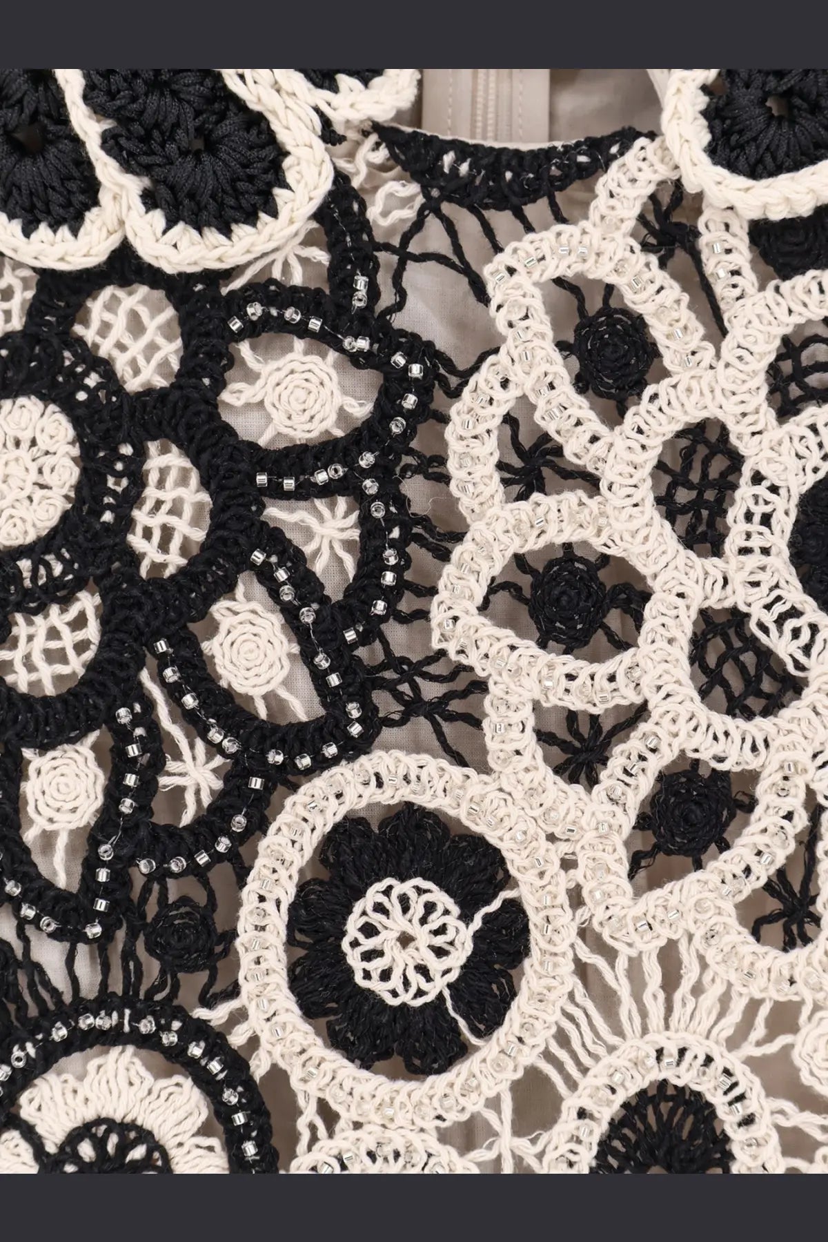Patbo women’s crochet mini dress in black featuring cream crochet lace with beaded floral motifs