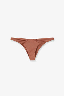 Patbo women’s lycra bikini bottoms orange in rust color with smooth satin fabric and ruched waistband thong style back view