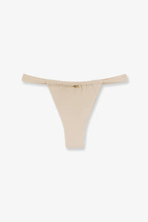 Beige Patbo women’s lycra thong bikini bottoms with a subtle gold logo on the waistband front center