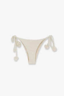 Cream-colored Patbo women’s nylon bikini bottoms with soft stretchy fabric and decorative pom-pom ties on each side