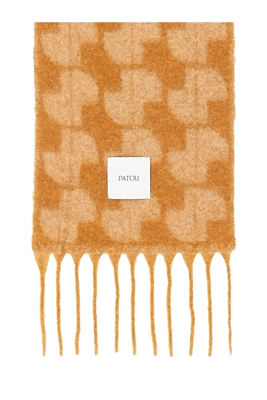 A soft caramel-colored Patou women’s JP scarf with a subtle geometric pattern and delicate fringe in beige
