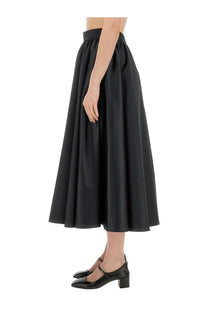 Patou women’s black high-waisted midi maxi skirt with a flowing pleated design in lightweight fabric