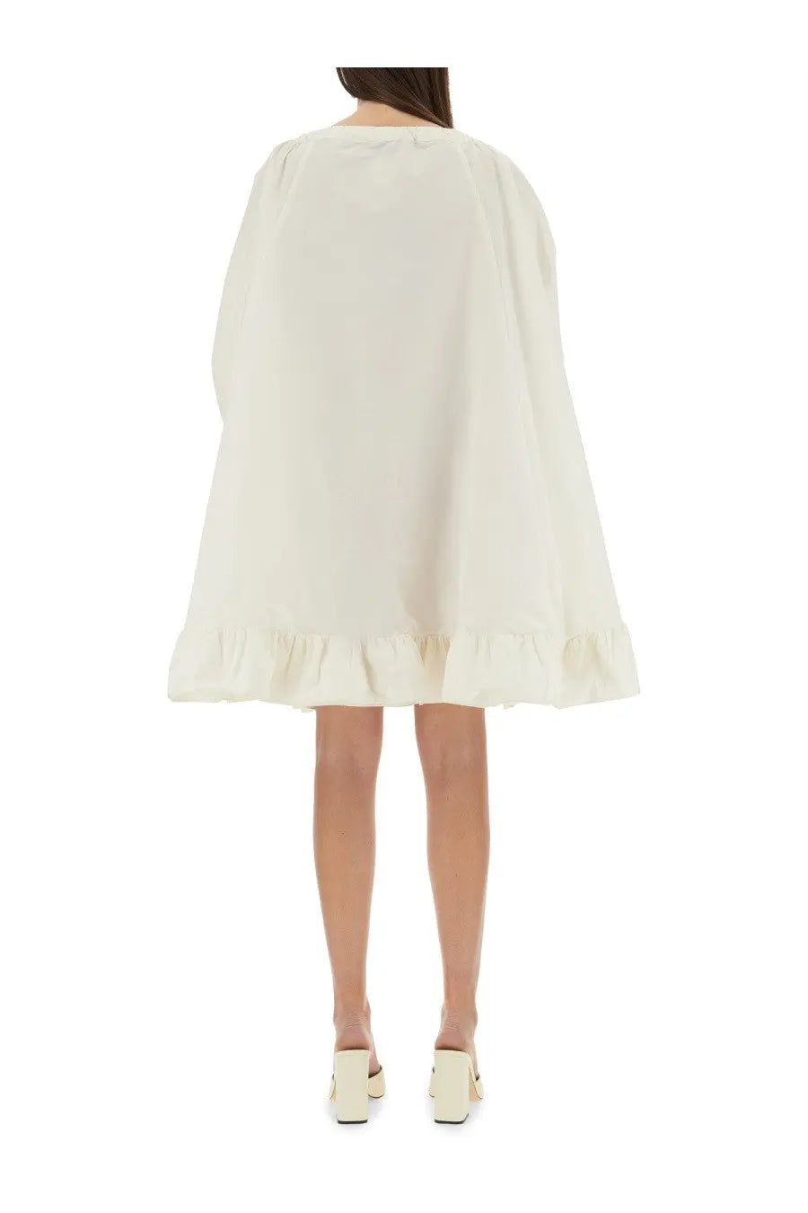 Patou women’s white ruffle hem dress flowing off-white cape style with soft airy fabric and ruffled hem