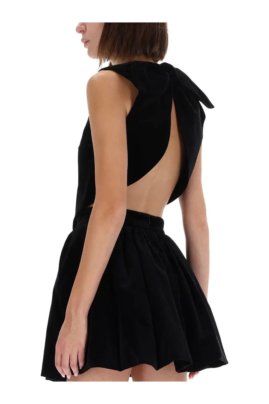 Back view of patou women’s black velvet mini dress featuring a bow detail perfect for evening wear