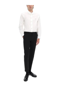 White button-down shirt with subtle logo on left chest paired with paul smith men’s black cotton tailored pants