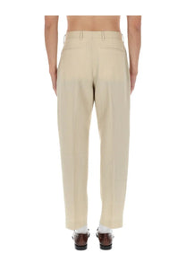 Beige paul smith men’s tailored trousers with clean straight-leg cut and subtle pleats at the back side