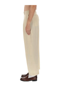 Paul Smith men’s pantalone sartoriale beige wide-leg trousers with smooth tailored fabric and clean straight-cut hem