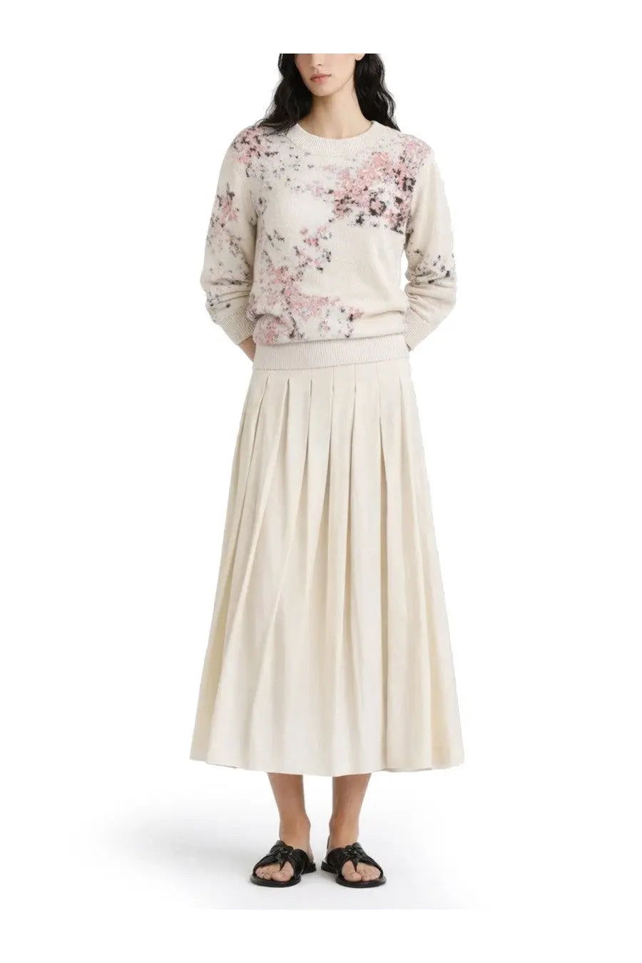 Beige pleated midi skirt with soft flowing silhouette paired with paul smith women’s multicolor cotton and mohair blend sweater
