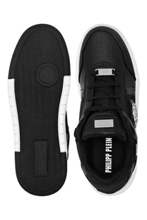 Black philipp plein men’s sneaker sk8r con with white rubber soles and metallic silver branding accents