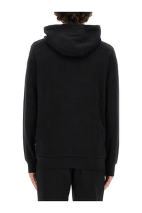 Philipp plein men’s black hooded sweatshirt with minimalist design and ribbed cuffs made from soft fabric