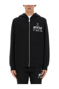 Philipp plein men’s black zip-up hoodie with white graphic print and silver zipper made from soft sweatshirt material