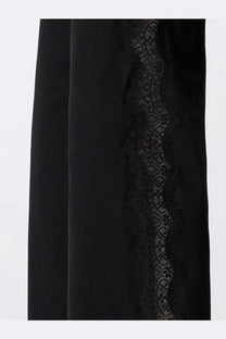 Pinko women’s black velvet skirt with delicate black lace trim down the side in denim trousers product image