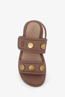 Pinko women’s Fiona flat leather sandals beige with brown straps gold-tone studs and small logo emblem on strap