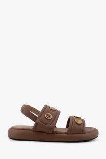 Pinko women’s Fiona flat leather sandals beige with brown leather straps and gold-tone circular buckles on cushioned sole