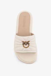 Cream-colored quilted leather slide sandal with gold-tone bird clasp from Pinko womens fiona leather sandals white