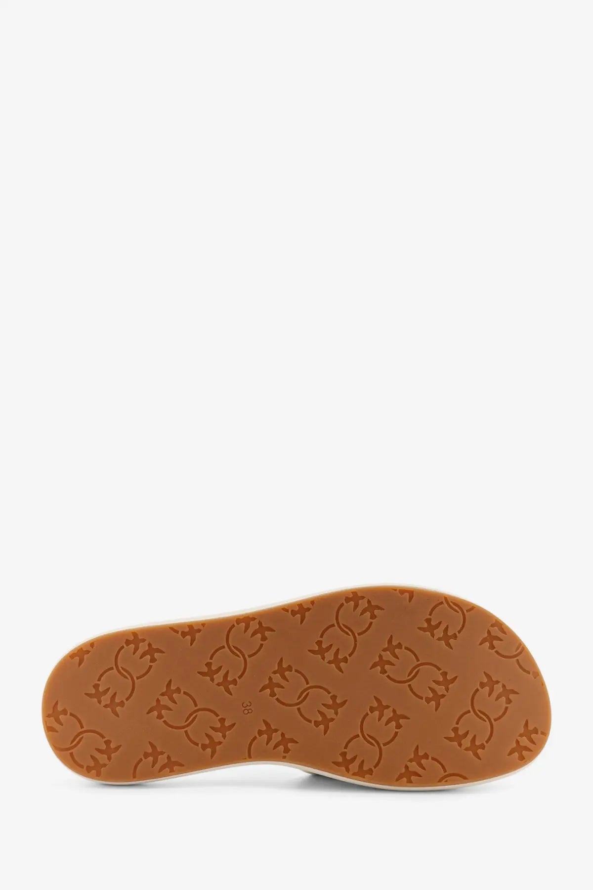 Tan rubber sole with embossed repeating logo pattern on pinko women’s fiona leather sandals white