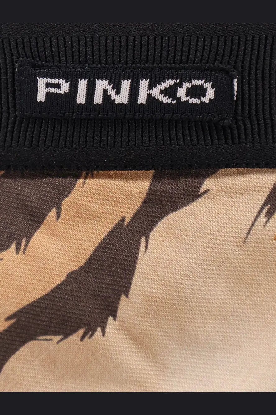 Black ribbed knit fabric with white pinko label on pinko women’s hollie viscose skirt gold