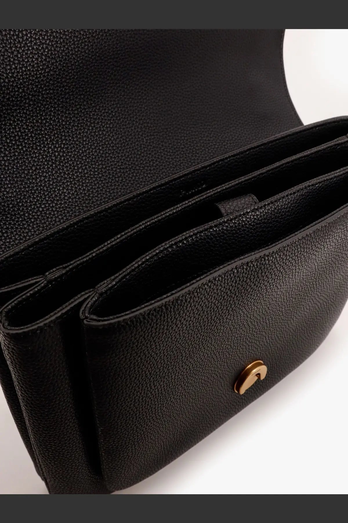 Pinko women’s black leather crossbody bag with pebbled texture and gold-tone circular clasp