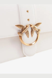 Pinko women’s white leather shoulder bag with gold-tone clasp featuring two detailed birds in flight