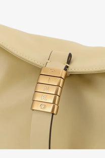 Beige leather pinko women’s shoulder bag with gold metal clasp engraved with pinko logo in yellow color
