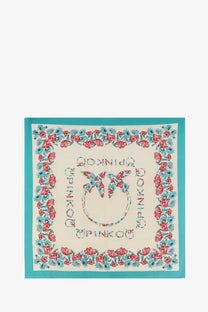 Cream-colored pinko women’s limbo silk and viscose blend square scarf with red and teal floral border and logo