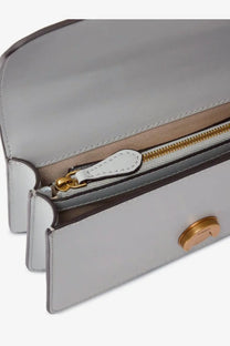 Pinko women’s love one mini leather crossbody bag in light gray leather with gold-tone hardware and white zipper pull