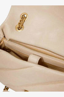 Cream-colored leather Pinko women’s Love Puff classic quilted crossbody bag with gold-tone chain hardware and zipper