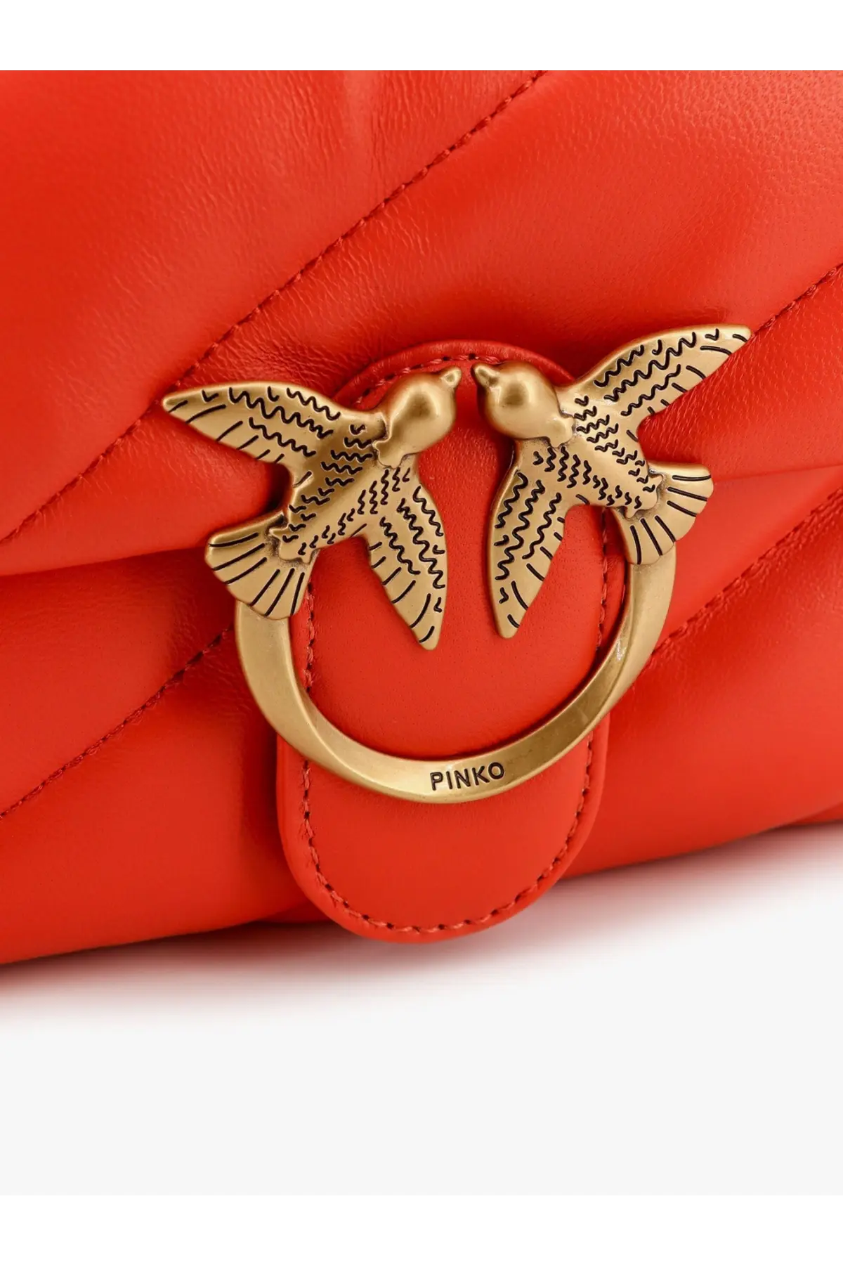 Pinko women’s red matelassé leather shoulder bag with vibrant orange quilted design and gold-tone bird clasp