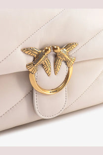Pinko women’s white cream-colored quilted leather shoulder bag with gold-tone clasp featuring two detailed birds