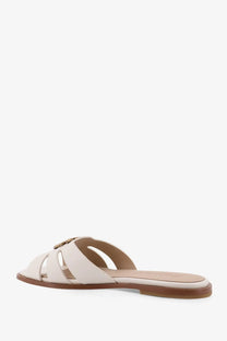 Pinko women’s Milly low cream-colored leather slide sandal with gold-tone buckle and brown rubber sole
