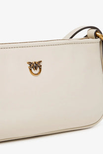 Pinko women’s mini half moon cream leather crossbody bag with gold-tone bird-shaped clasp in white color