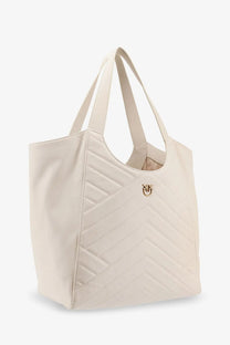Cream-colored quilted leather tote bag with gold-tone pinko logo emblem designed for women shoulder use