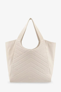 Cream-colored pinko women’s quilted leather shoulder bag with chevron pattern and soft structured handles