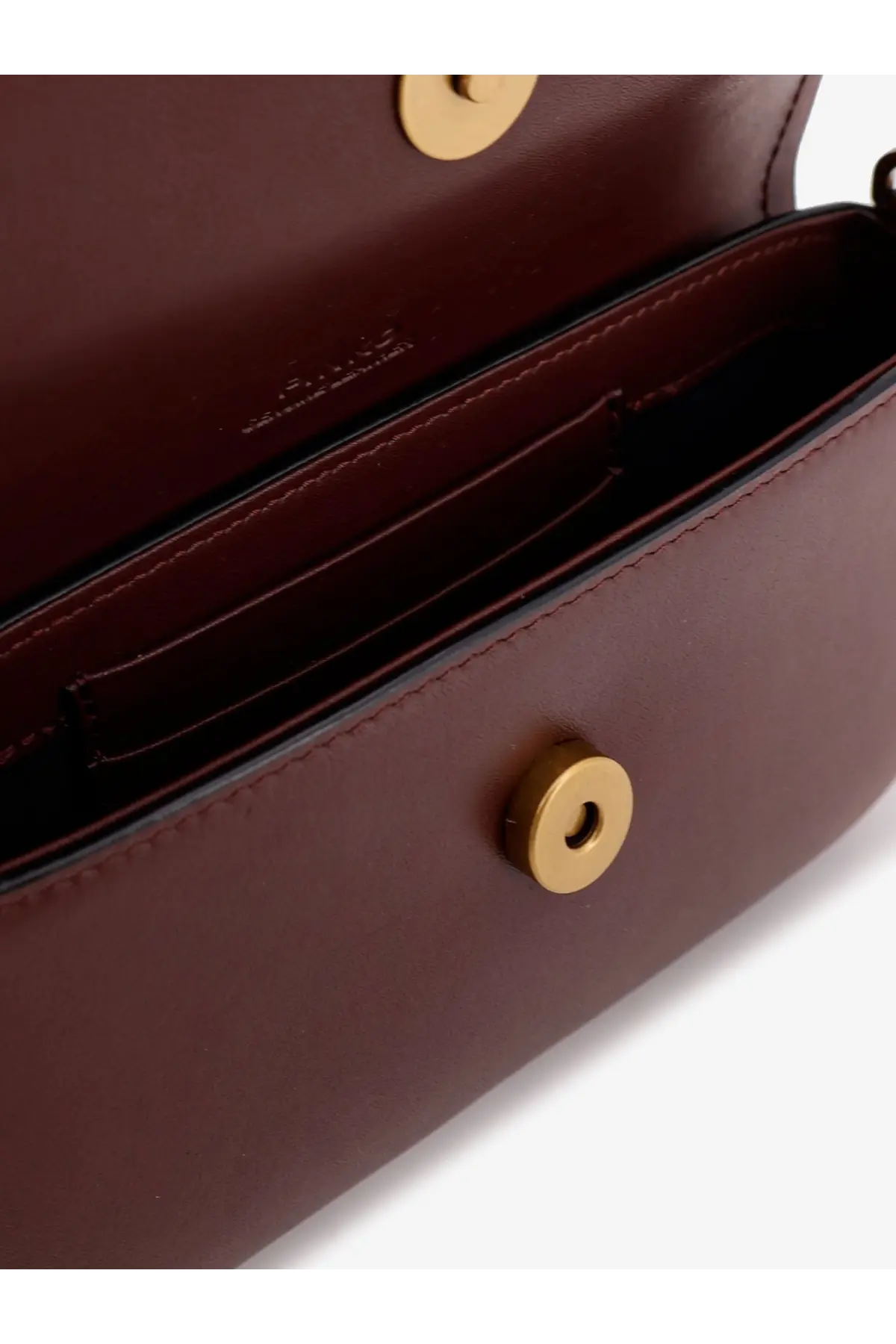 Pinko women’s saddle flat leather crossbody bag in rich burgundy with gold-tone circular clasps and precise stitching
