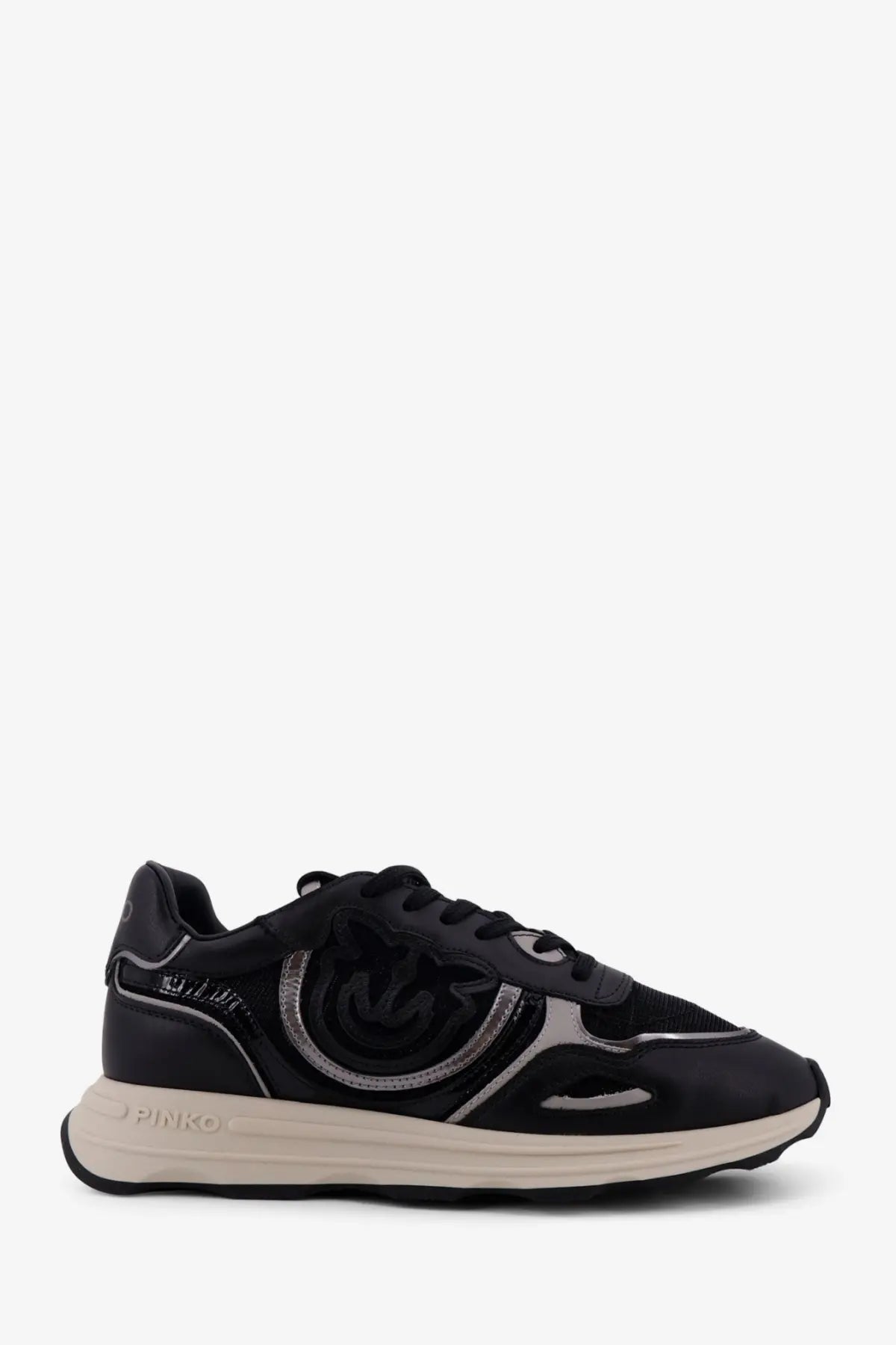 Pinko women’s Zoe leather sneakers in black with silver glossy finish and smiley face logo on the side