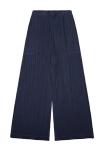 Navy blue pleated wide-leg trousers with high waist and subtle vertical ridges by Pleats Please Issey Miyake