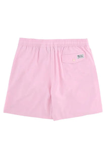 Back view of polo ralph lauren men’s pink swim trunks with elastic waistband and a single buttoned pocket