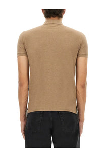 Beige short-sleeved polo shirt with ribbed collar and cuffs made of cotton by Polo Ralph Lauren for men