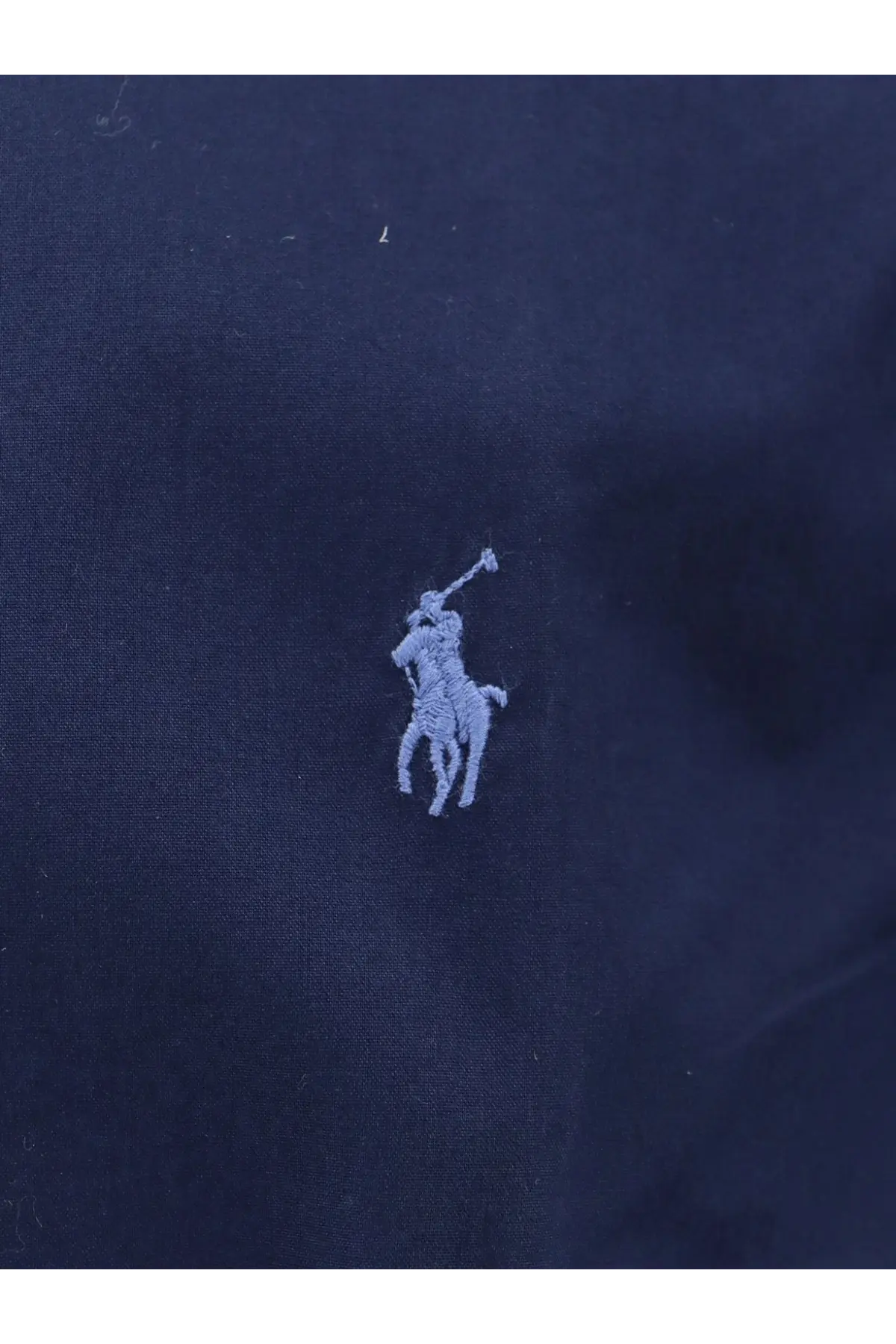 Navy blue polo ralph lauren men’s cotton shirt with light gray embroidered logo on the front