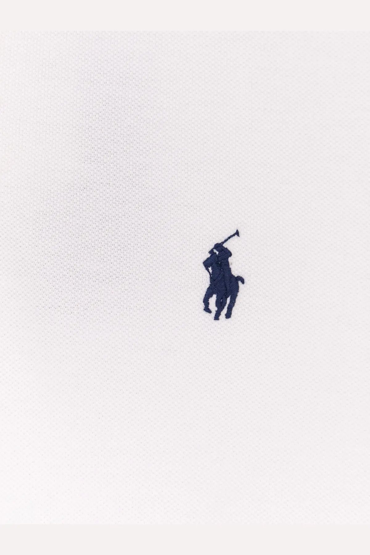 White polo ralph lauren cotton shirt featuring navy blue embroidered pony logo on the front