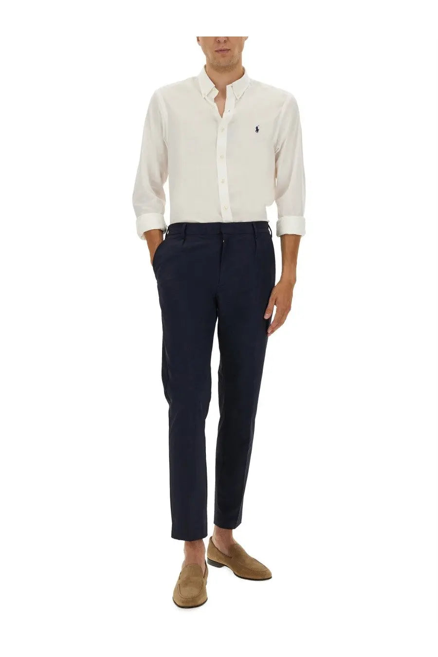 Navy blue tailored cotton trousers with sleek modern cut and subtle creases complementing polo ralph lauren shirt