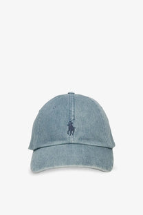 A light blue denim baseball cap with dark navy embroidered Polo Ralph Lauren logo on the front