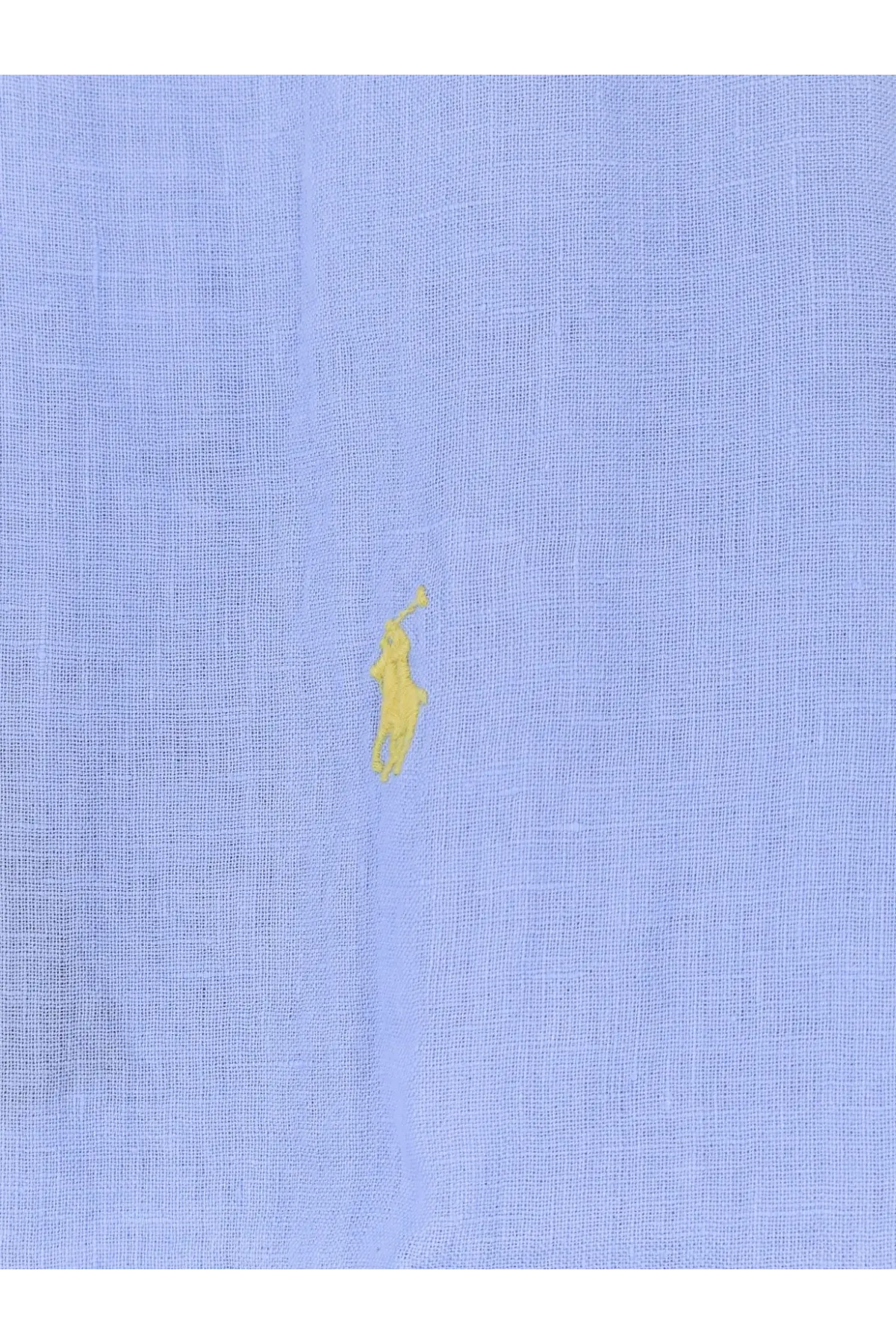 Light blue linen polo ralph lauren men’s shirt with small yellow embroidered polo player logo on the front