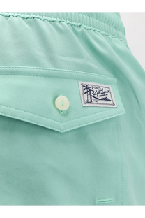 Mint green cotton Polo Ralph Lauren men’s swim trunks with a buttoned flap pocket and embroidered brand patch