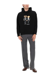 Black hooded sweatshirt featuring graphic of two bears in tuxedos on front by Polo Ralph Lauren unisex felpa