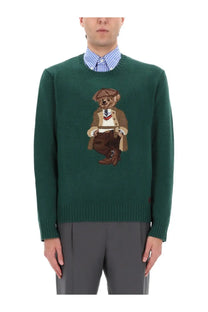 Dark green knit sweater featuring an embroidered teddy bear in a vintage suit and hat by Polo Ralph Lauren unisex