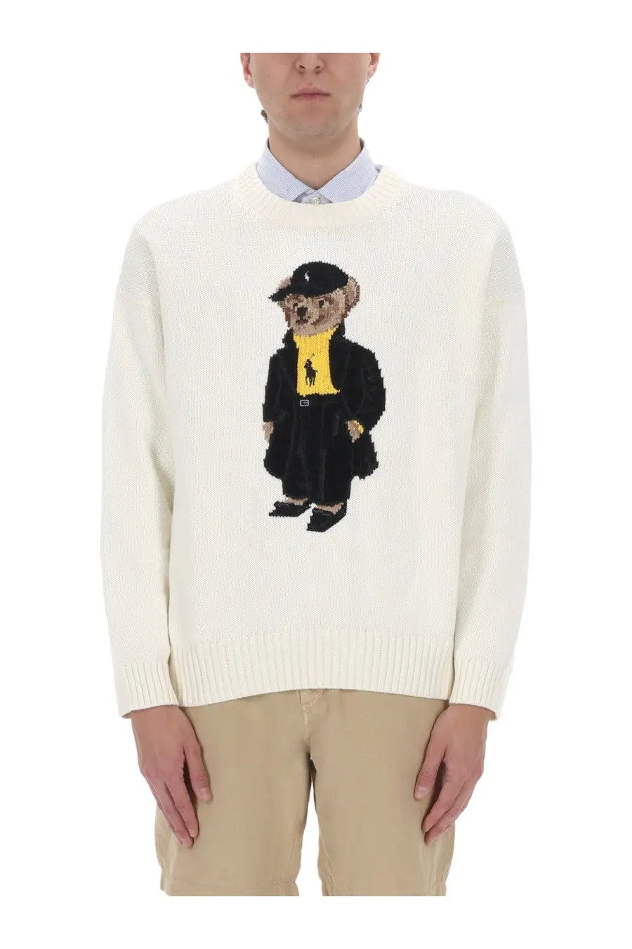 Cream-colored knit unisex Polo Ralph Lauren sweater featuring embroidered bear in black suit and yellow shirt