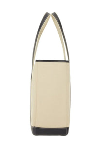 Cream-colored canvas tote bag with black leather trim and handles from Polo Ralph Lauren women’s borsa shopper medium beige