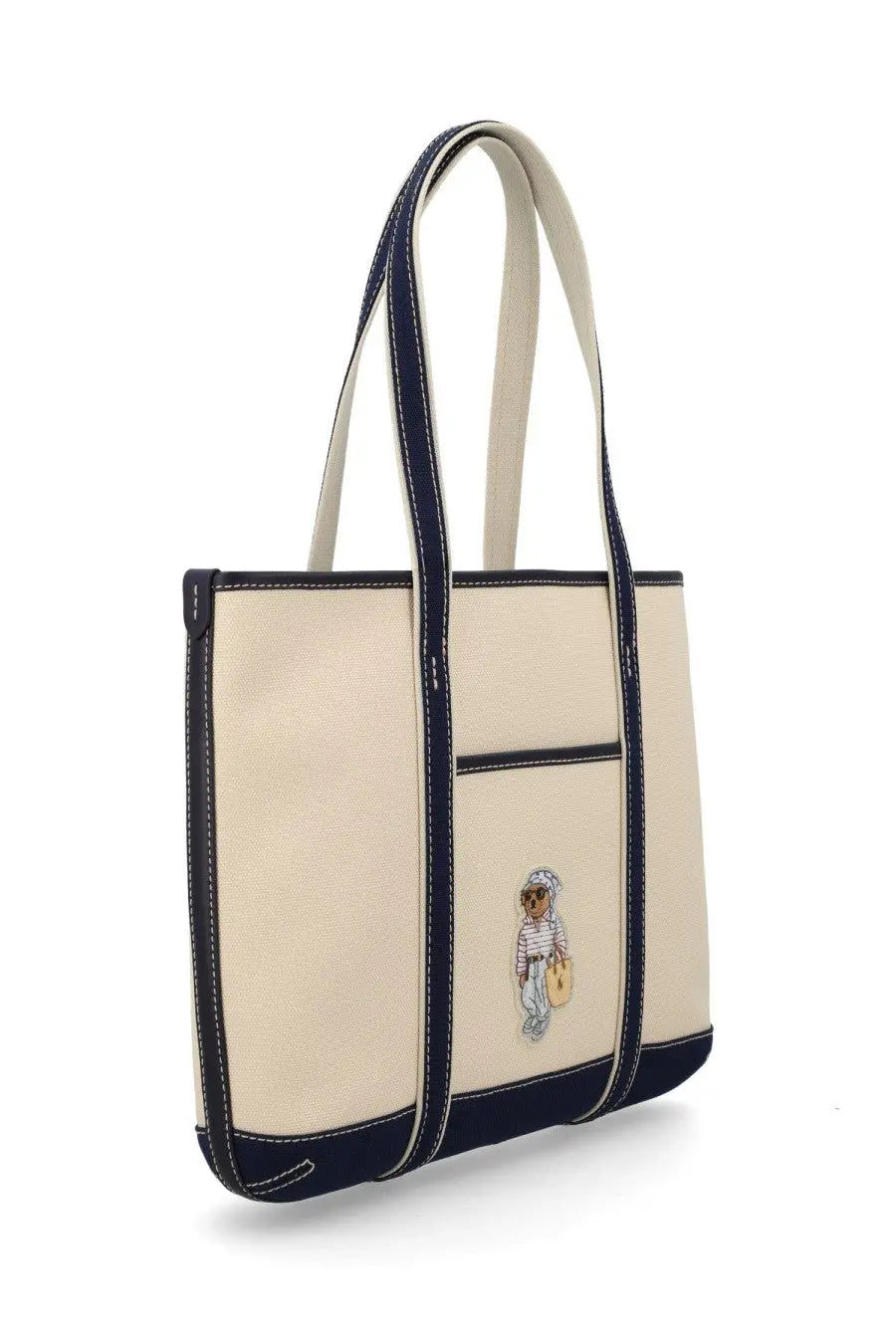 Cream-colored canvas polo ralph lauren women’s borsa tote bag with navy trim and embroidered bear design
